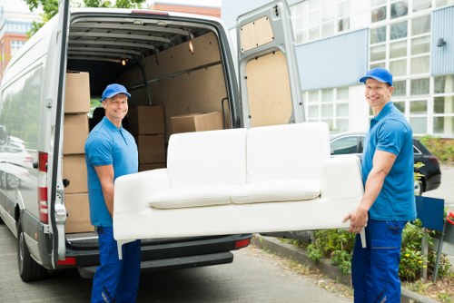 Man and van team preparing a safe move with protective equipment