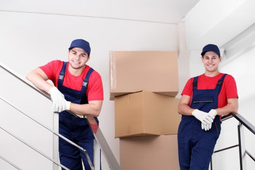 Furniture removal team handling large household items in Ickenham