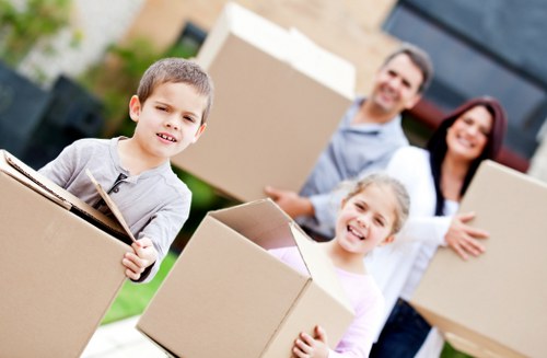 Specialist movers securing a piano for safe loading and delivery