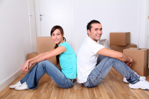 Careful loading of sofas and cabinets for a local move