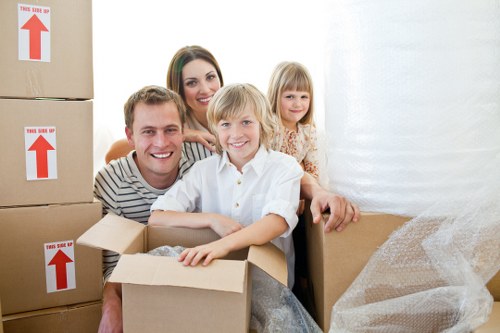 Moving staff using careful lifting techniques during a relocation
